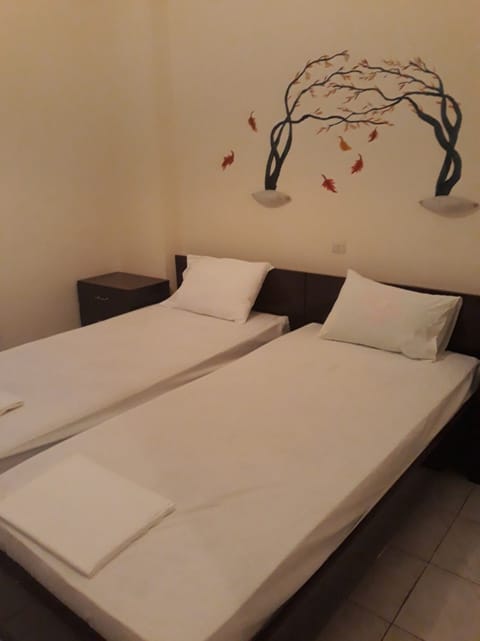 Basic Twin Room | Iron/ironing board, free WiFi, bed sheets