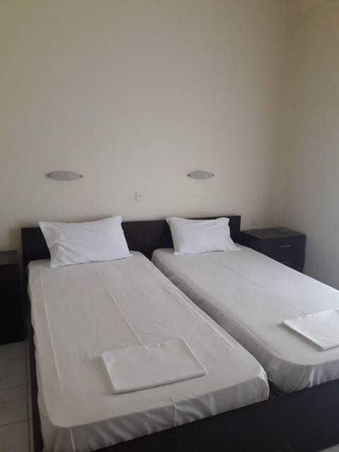 Basic Twin Room | Iron/ironing board, free WiFi, bed sheets