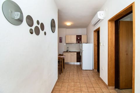 Apartment (A1) | Private kitchen | Fridge, stovetop, cookware/dishes/utensils, freezer