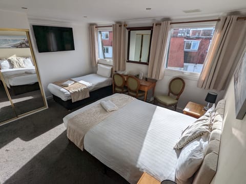 Family Room | Desk, iron/ironing board, free cribs/infant beds, free WiFi