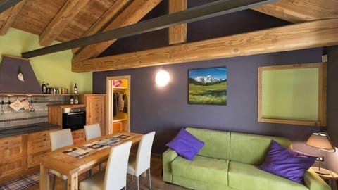 Apartment, 1 Bedroom (Il Melo) | Living area | LED TV, heated floors