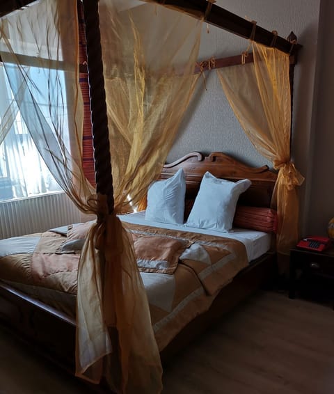 Family Quadruple Room | 1 bedroom, minibar, desk, blackout drapes