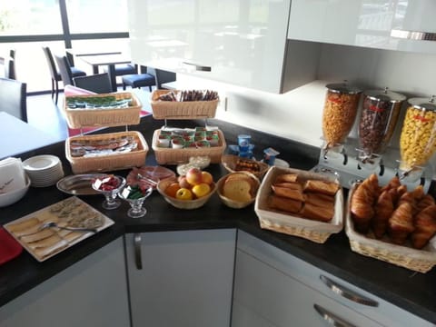 Daily buffet breakfast (EUR 8.5 per person)