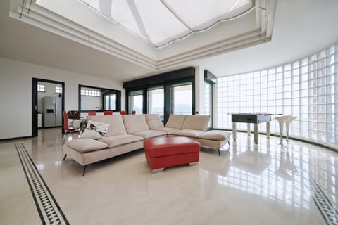 Exclusive Villa, 4 Bedrooms | Living room | Flat-screen TV, fireplace