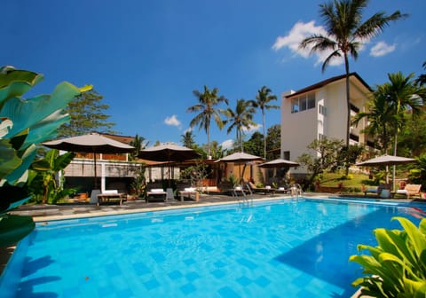 2 outdoor pools, pool umbrellas, sun loungers
