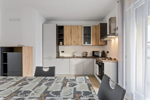 Apartment, 3 Bedrooms | Private kitchen | Full-size fridge, stovetop, electric kettle, cookware/dishes/utensils