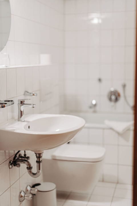 Double Room | Bathroom | Shower, hair dryer, towels, toilet paper