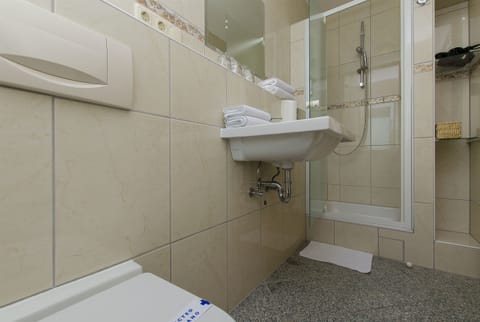 Studio (A2) | Bathroom | Bathrobes, slippers, towels