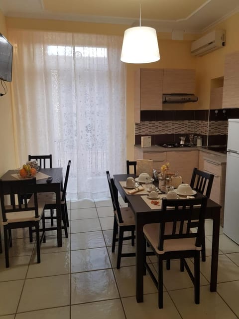 Fridge, stovetop, toaster oven, cookware/dishes/utensils