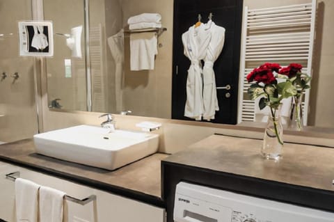 Suite, 2 Bedrooms, City View | Bathroom | Bathtub, eco-friendly toiletries, hair dryer, bathrobes