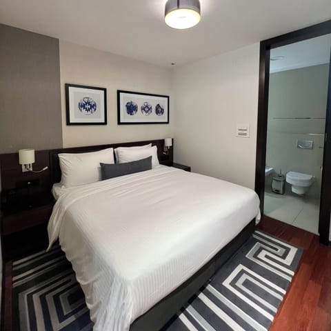 Suite, 2 Bedrooms | Hypo-allergenic bedding, down comforters, in-room safe, desk