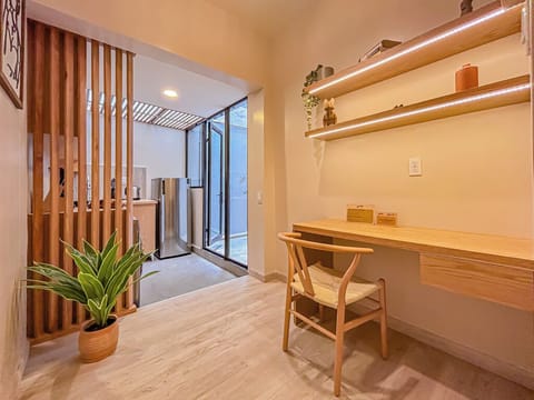 Signature Apartment | Living area | 55-inch Smart TV with digital channels, smart speakers