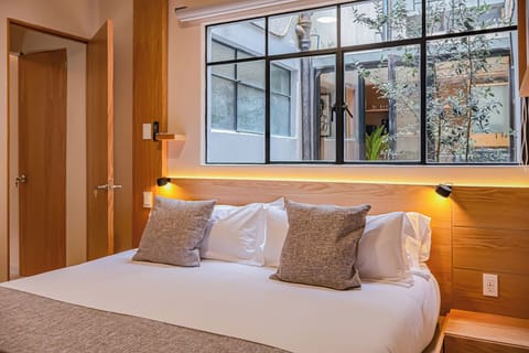 Signature Apartment | Egyptian cotton sheets, premium bedding, down comforters