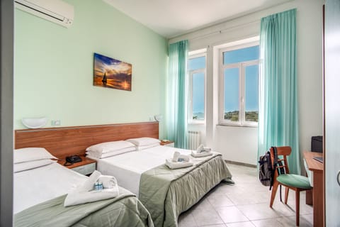 Standard Triple Room | In-room safe, iron/ironing board, cribs/infant beds, free WiFi