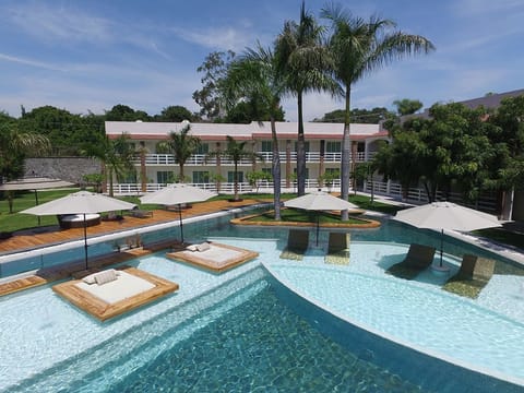 Outdoor pool, open 8:00 AM to 8:00 PM, pool umbrellas, sun loungers