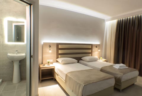 Double or Twin Room | 1 bedroom, hypo-allergenic bedding, pillowtop beds, in-room safe