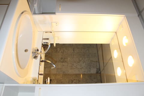 Economy Quadruple Room, Multiple Beds (Basement) | Bathroom | Hair dryer