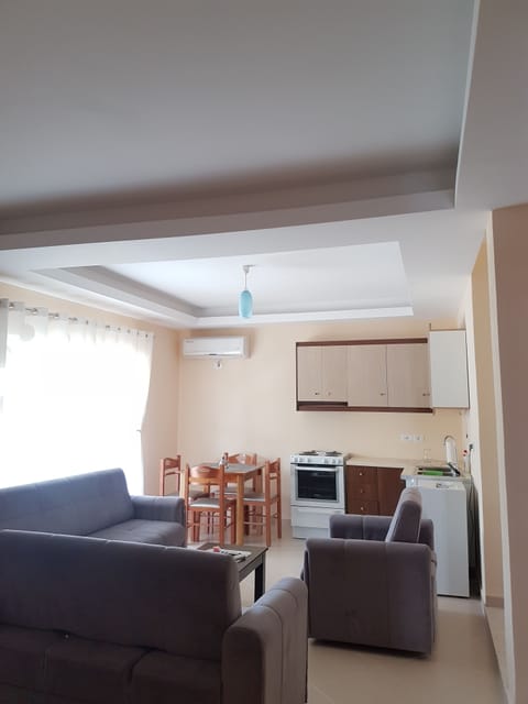 Comfort Apartment | Living area | Flat-screen TV