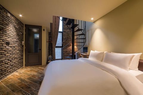 Premium bedding, down comforters, individually decorated