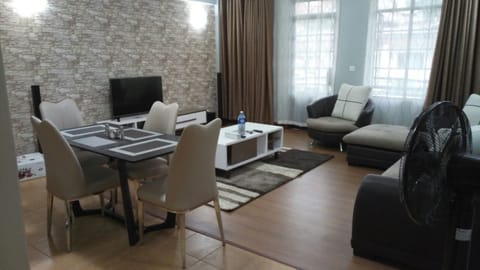 Apartment, 2 Bedrooms | Living room | Flat-screen TV