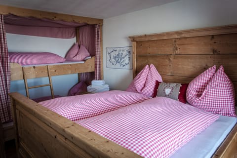 Basic Quadruple Room, Shared Bathroom | Free WiFi, bed sheets