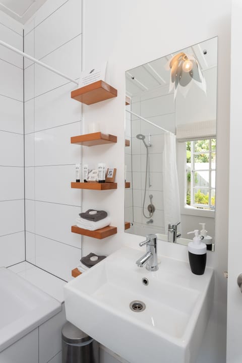 Kauri Garden Studio | Bathroom | Designer toiletries, hair dryer, bathrobes, towels