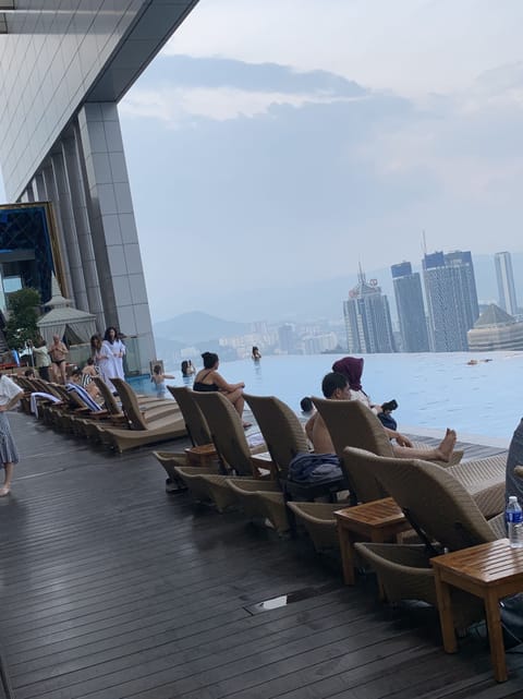 Outdoor pool, open 10:00 AM to 10:00 PM, sun loungers