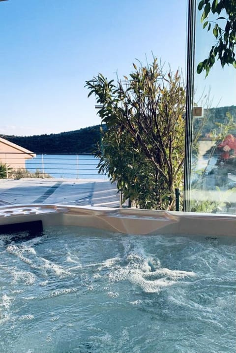 Outdoor pool, a heated pool, sun loungers