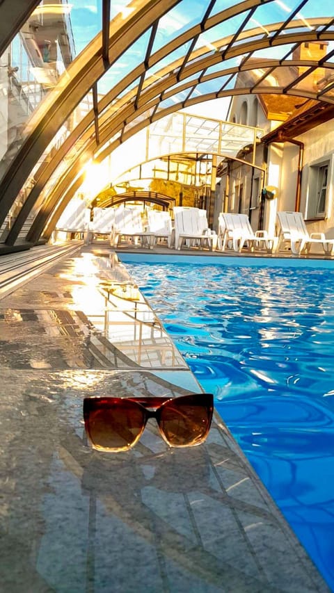 Indoor pool, seasonal outdoor pool, sun loungers