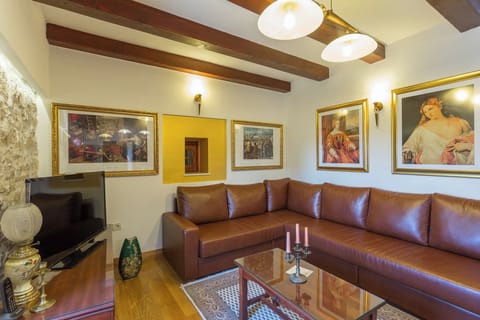 Family Suite, 2 Bedrooms | Living area | 152-cm flat-screen TV with satellite channels, TV