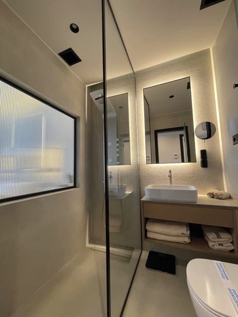 Hair dryer, bathrobes, slippers, towels