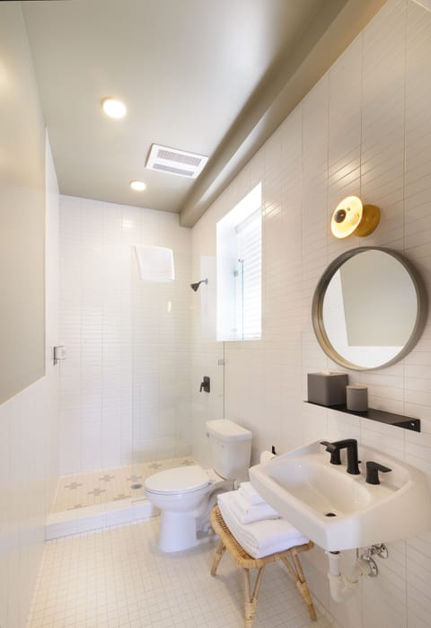 Laughlin Room | Bathroom | Shower, designer toiletries, hair dryer, bathrobes