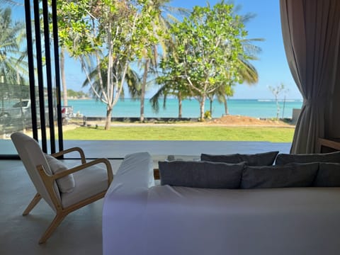 1 Bedroom Beach Front Villa | Living area | 40-inch Smart TV with digital channels
