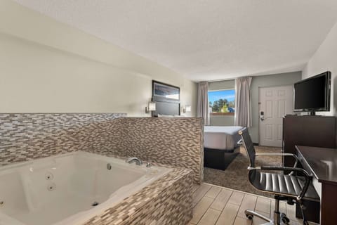 Pillowtop beds, laptop workspace, blackout drapes, iron/ironing board