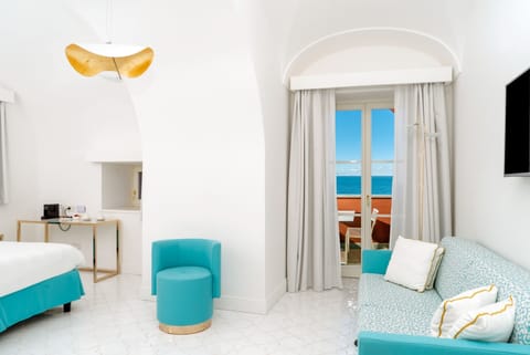 Deluxe Room, Sea View (Superior) | Living area | Flat-screen TV