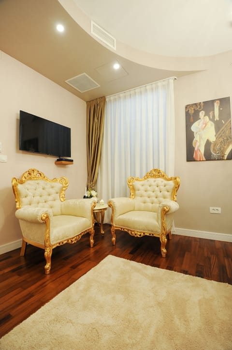 Deluxe Double Room, Balcony | Living area | Flat-screen TV