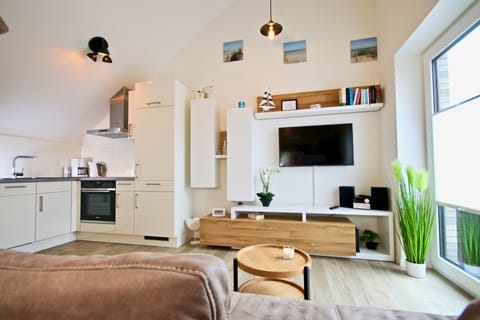 Sonnengarten 11 | Living area | Flat-screen TV