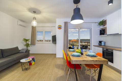 Executive Apartment, Balcony | Private kitchen | Full-size fridge, oven, stovetop, dishwasher