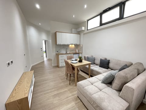 Comfort Apartment, 1 Bedroom, Balcony | Living area | 33-inch Smart TV with cable channels, heated floors