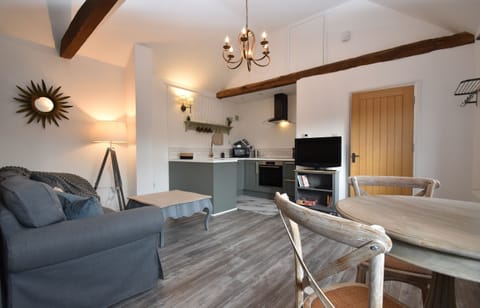 Cottage, 1 Bedroom | Living area | 35-inch flat-screen TV with digital channels, TV, DVD player