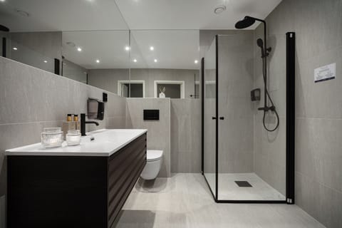 Double Room | Bathroom | Shower, eco-friendly toiletries, heated floors, towels