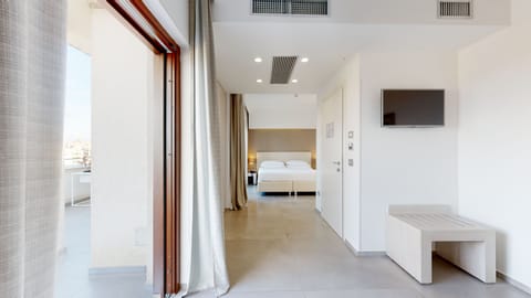 Junior Suite, Terrace, City View | Premium bedding, down comforters, minibar, in-room safe