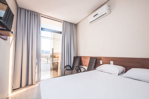 Family Room | Minibar, blackout drapes, iron/ironing board, free WiFi