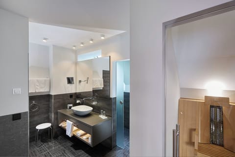 Superior Suite, Multiple Beds, Balcony | Bathroom | Free toiletries, hair dryer, bathrobes, towels