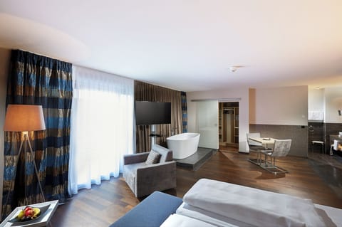 Superior Suite, Multiple Beds, Balcony | Free minibar, in-room safe, desk, laptop workspace