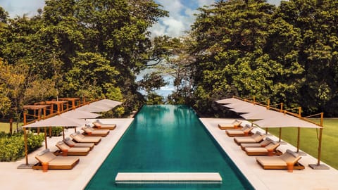 3 outdoor pools, open 9:00 AM to 6:00 PM, free cabanas, pool umbrellas