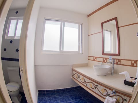 Quadruple Room | Bathroom | Combined shower/tub, deep soaking tub, rainfall showerhead