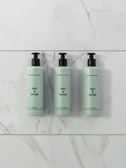 Shower, rainfall showerhead, designer toiletries, hair dryer