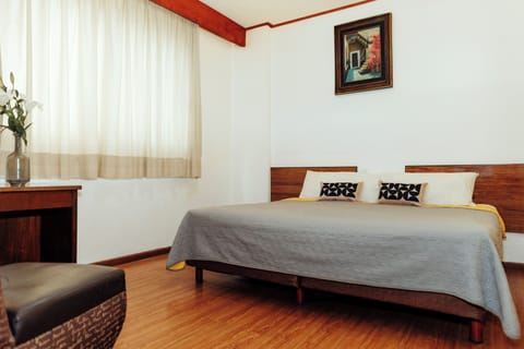 Room, 1 King Bed (No air conditioning) | Free WiFi, bed sheets