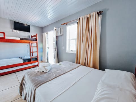Family Triple Room | Minibar, in-room safe, free WiFi, bed sheets